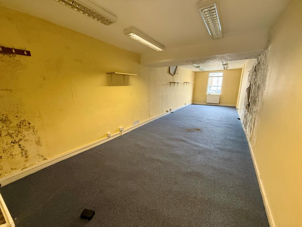 Lot: 58 - PLANNING PERMISSION GRANTED FOR CONVERSION INTO TWO SHOPS AND SIX ONE-BEDROOM FLATS - First floor